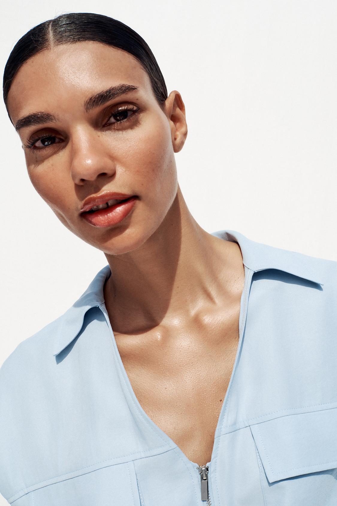 ÄRMELLOSE SAFARI-BLUSE MIT KORDBUND