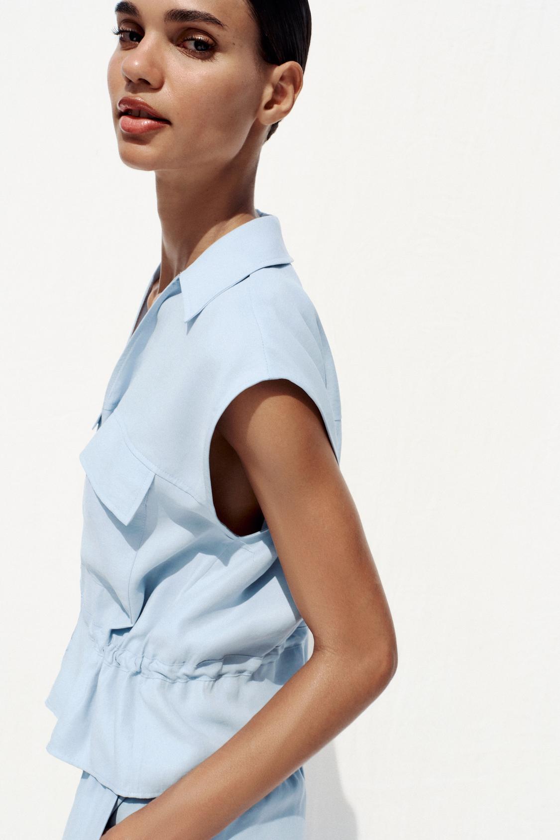 ÄRMELLOSE SAFARI-BLUSE MIT KORDBUND