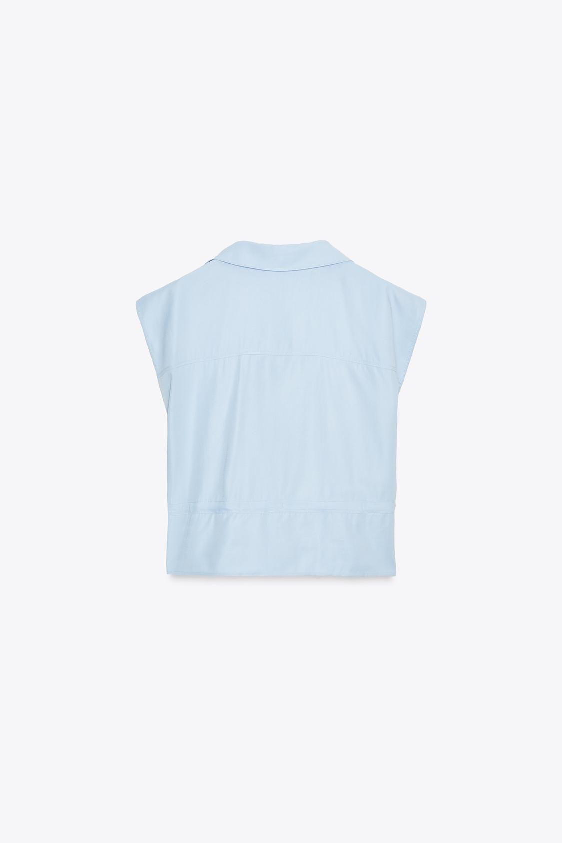 ÄRMELLOSE SAFARI-BLUSE MIT KORDBUND