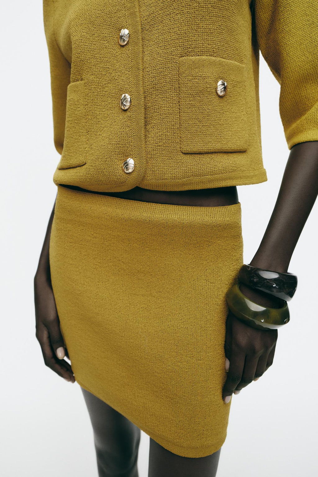 SIGNATURE MINI-JUPE AUS FEINSTRICK