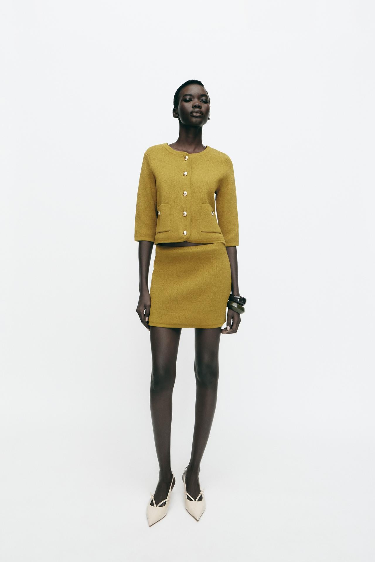 SIGNATURE MINI-JUPE AUS FEINSTRICK