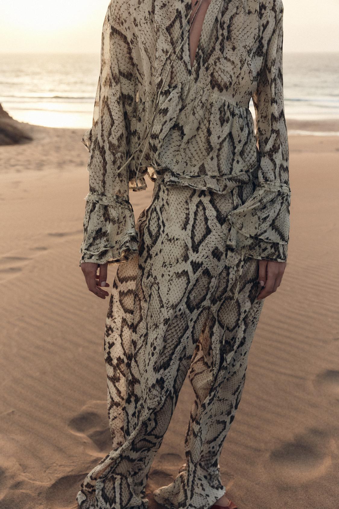 SEMI-TRANSPARENTE HOSE MIT ANIMAL-PRINT