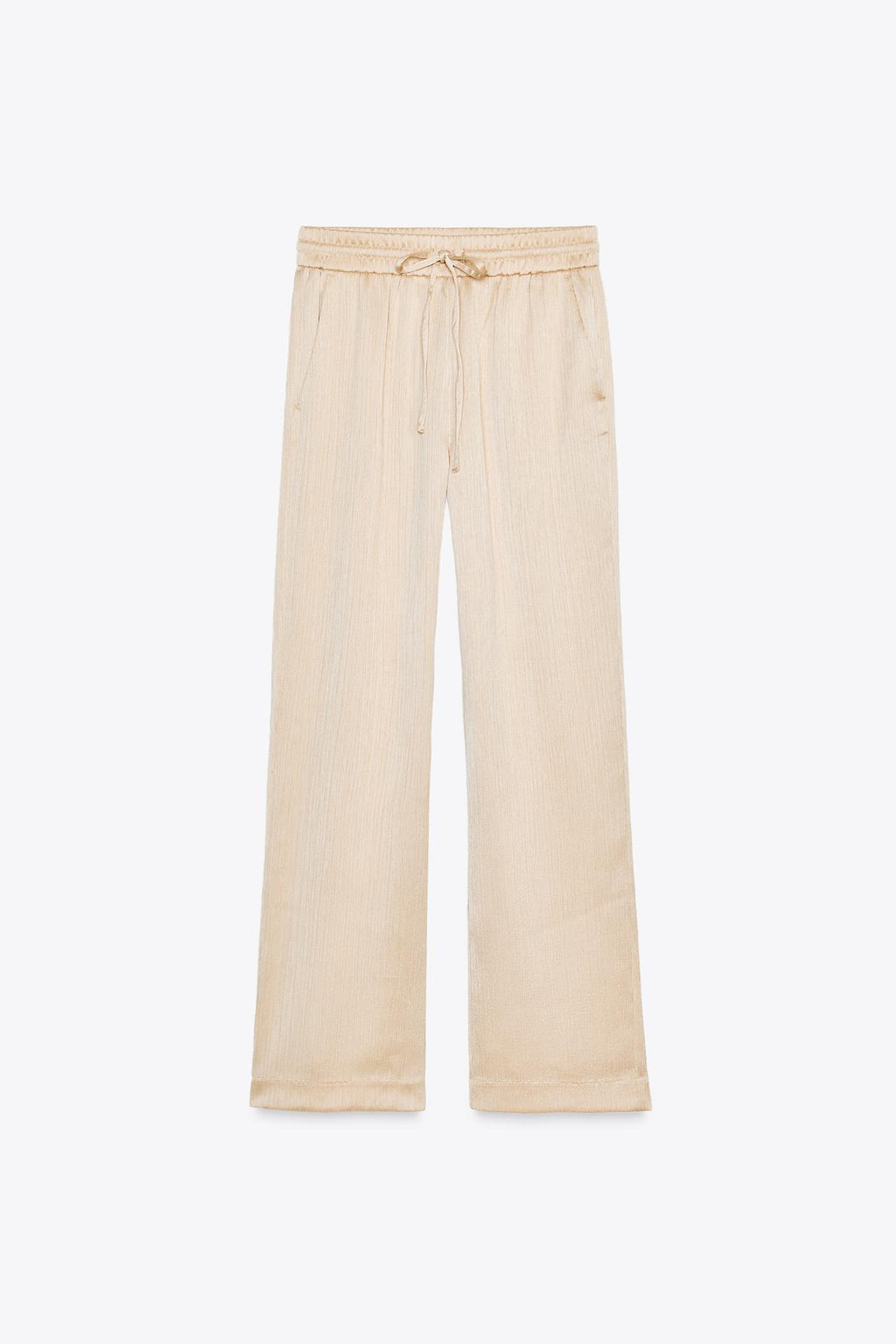 WEITE HOSE MIT FLUIDER SILHOUETTE IN BEIGE