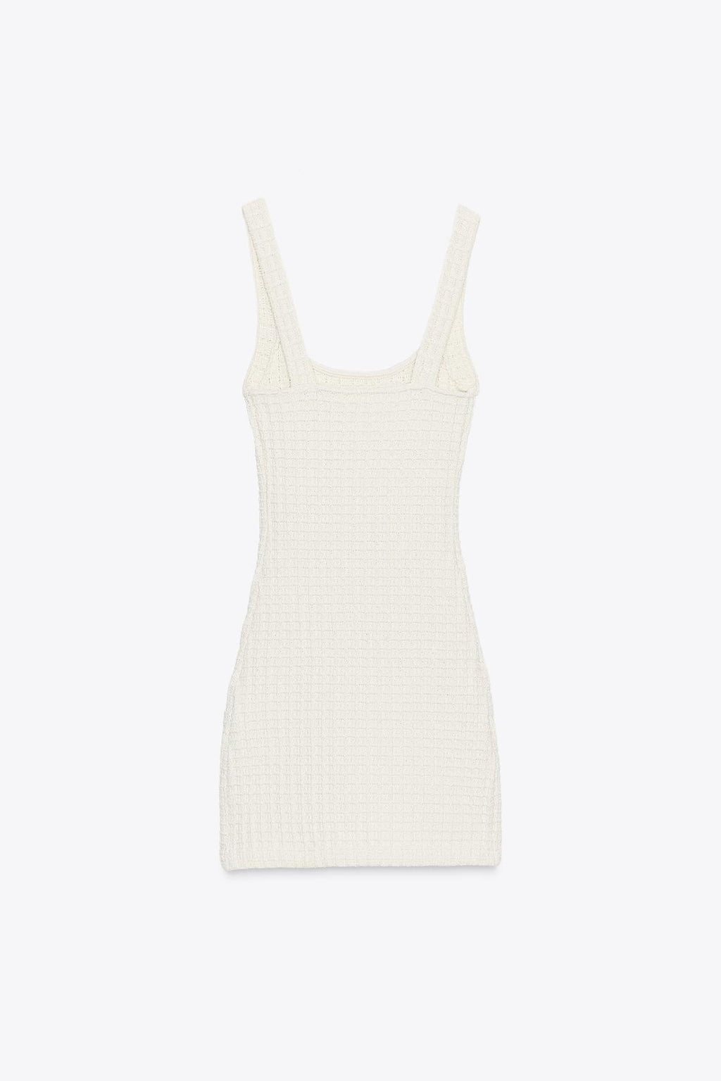 KURZES STRETCHKLEID IN NATURWEISS MIT SCHWARZEN AKZENTEN