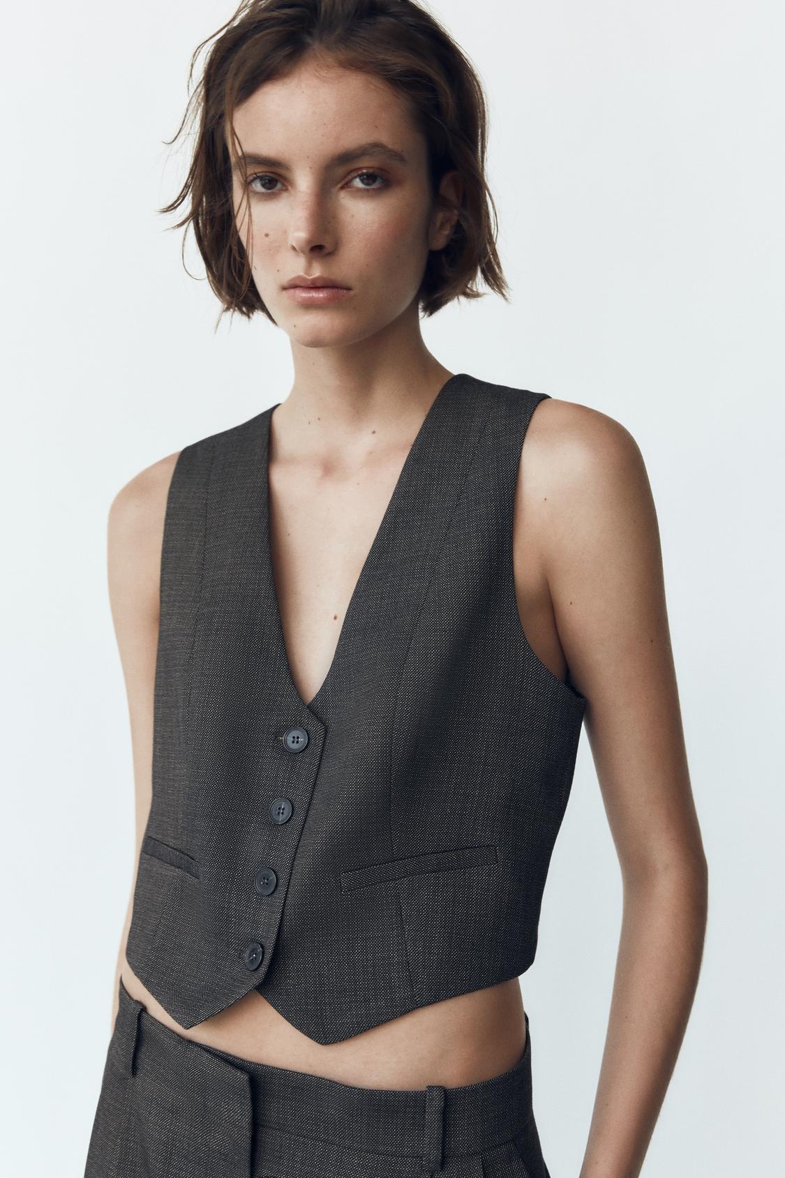 TAILLIERTE WESTE MIT V-AUSSCHNITT