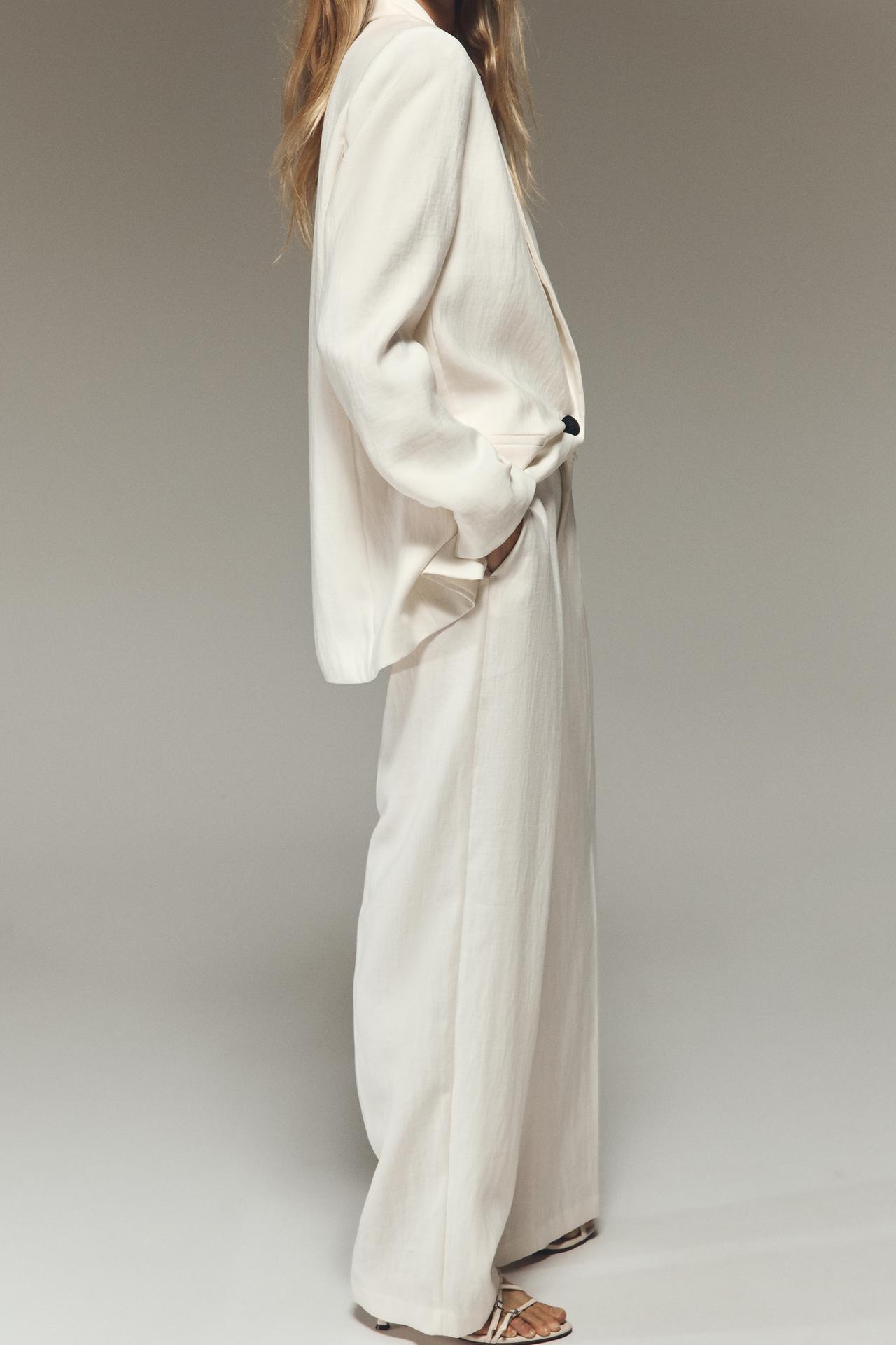 HOSE MIT STRUKTURIERTEM FALL IN ELFTON